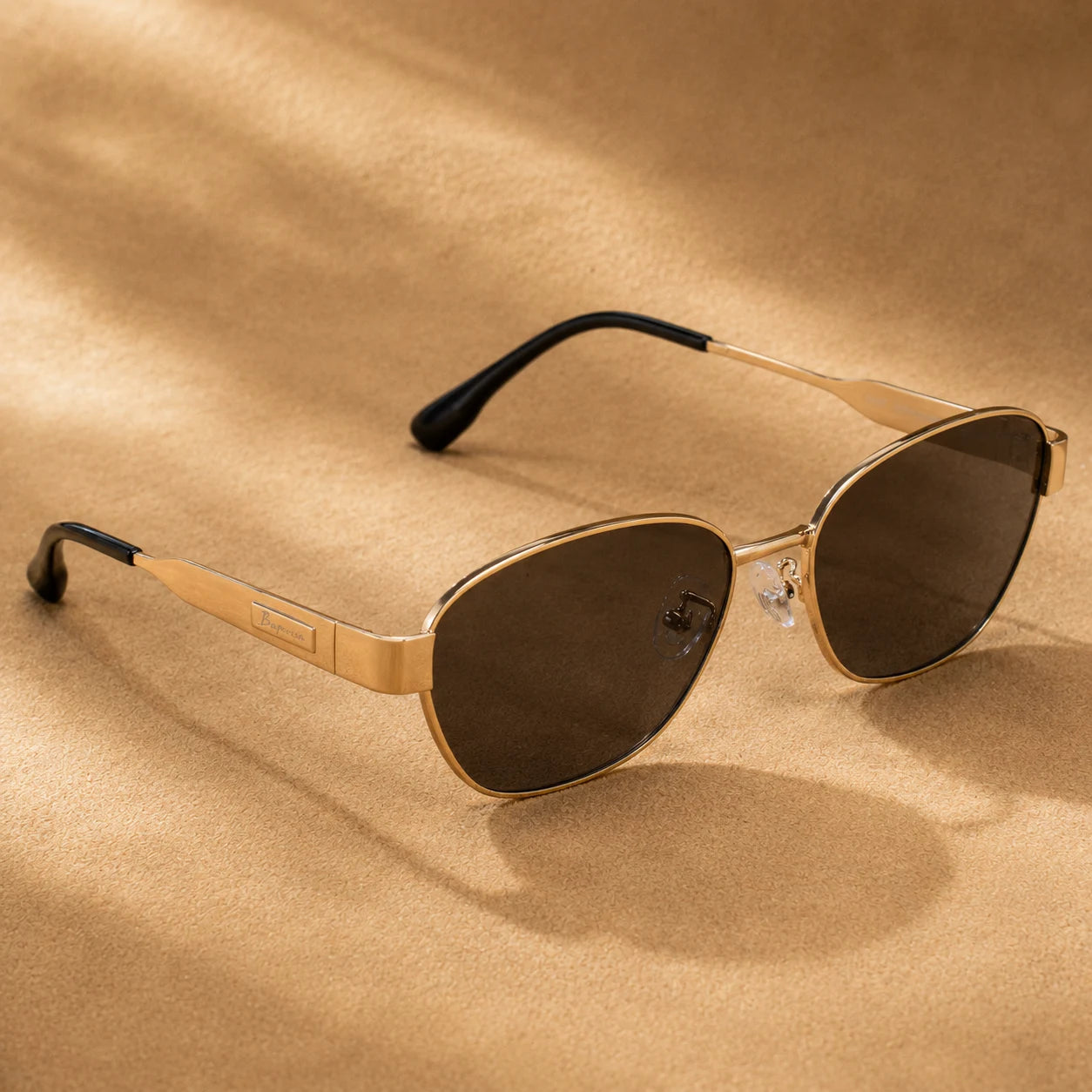 BAPORSSA Aurelia vintage cat-eye sunglasses with gold metal frame, smoke nylon lenses, adjustable nose pads, and black temple tips