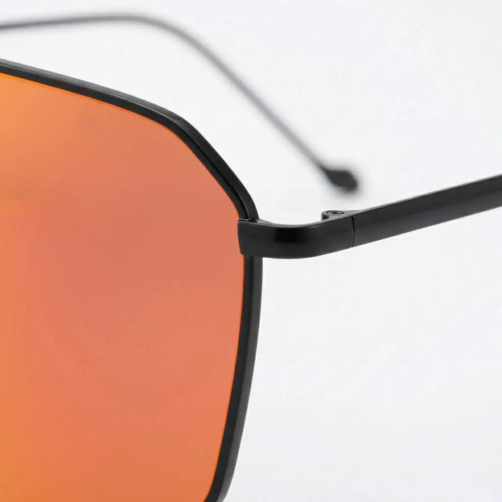 Multiple views of oversized, shield-style sunglasses with vibrant orange mirrored lenses and a sleek black metal frame.