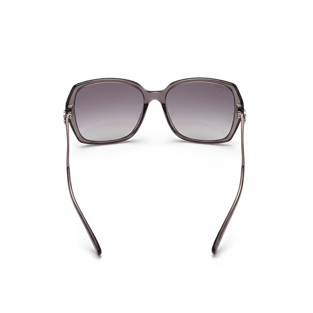 Sunglasses with gradient lenses on a white background