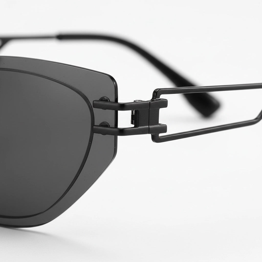 Close-up of a black sunglasses with a white background