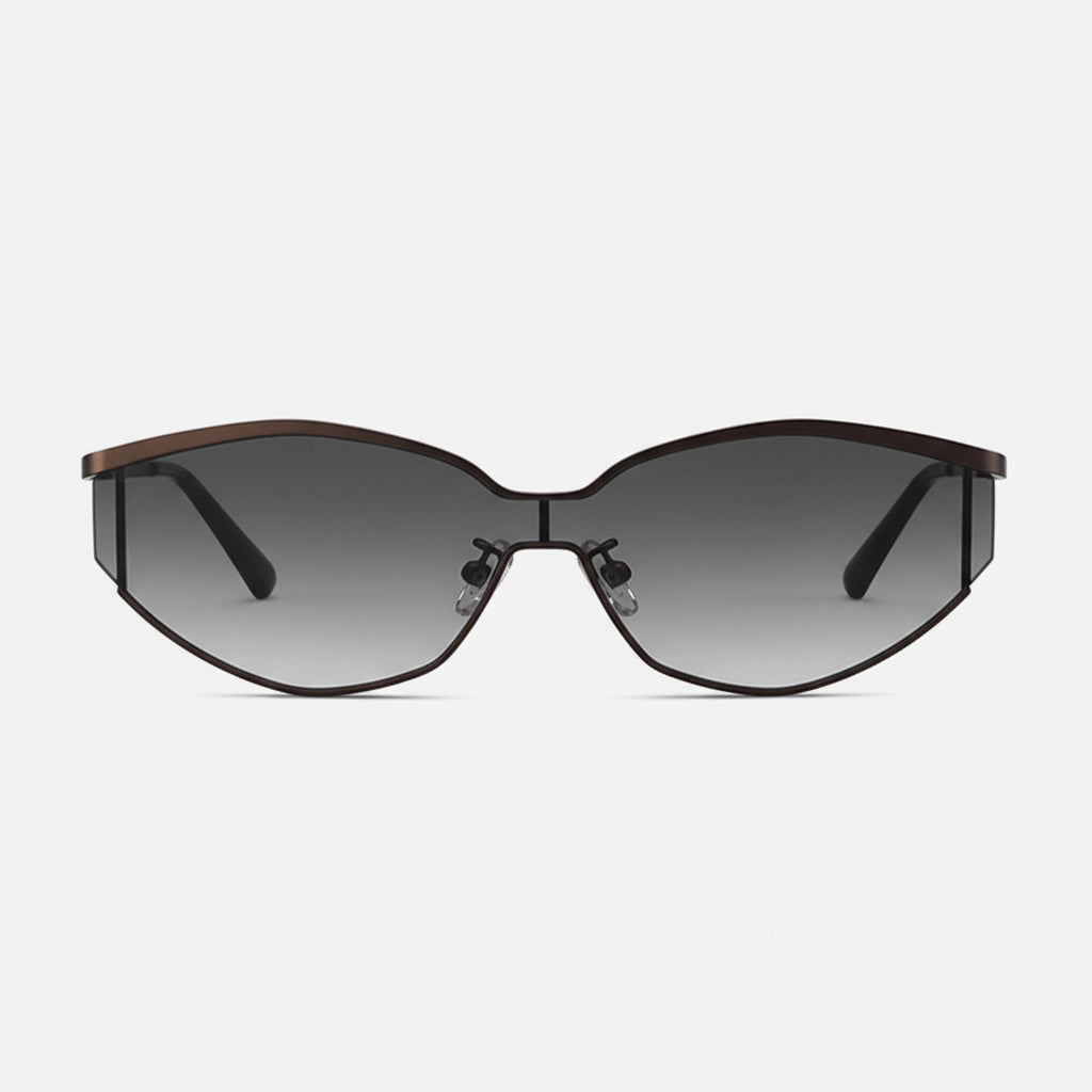 Front perspective of a pair of chic cat-eye sunglasses featuring gradient gray lenses and a brown metal frame.
