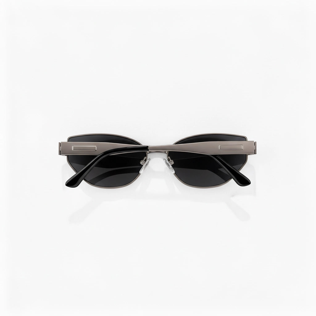Cat-eye titanium alloy sunglasses, top view, gunmetal gray frame and black temples