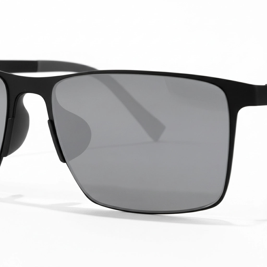 Black sunglasses with gray lenses on a white background