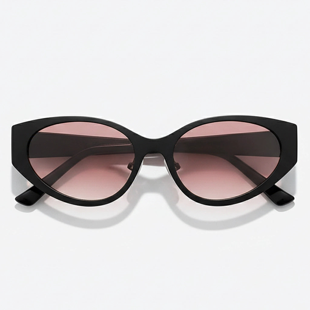 Black cat-eye sunglasses with pink lenses on a white background