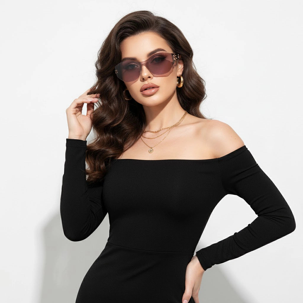 A woman styles pink shield sunglasses with a black off-shoulder dress, emphasizing the design’s ability to add a sleek, high-end touch to evening-ready looks.