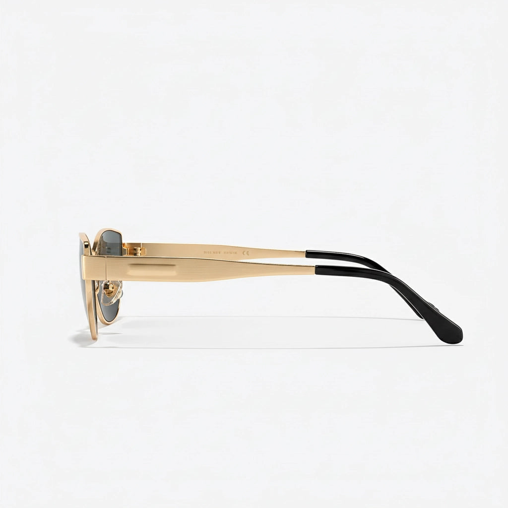 Side view of luxury gold titanium cat-eye sunglasses showing ultra-thin temples and black tips