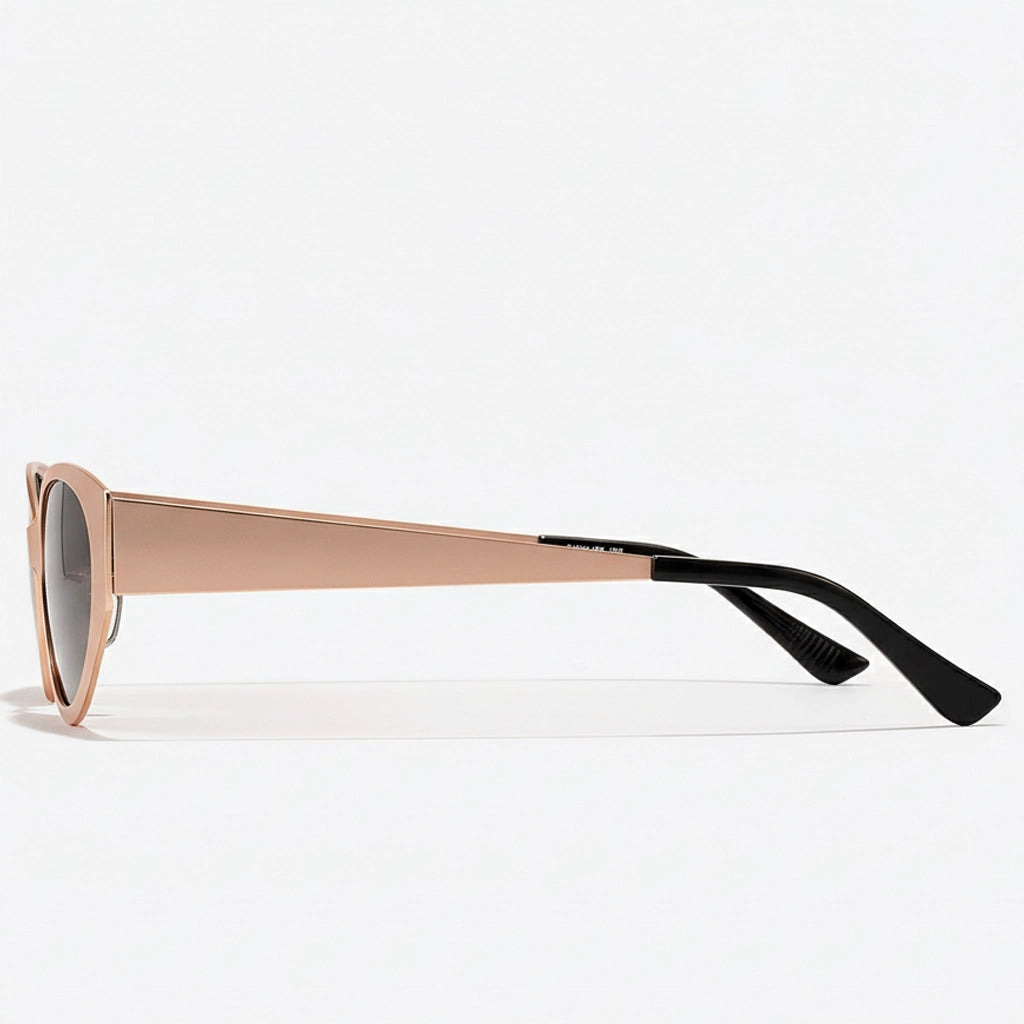 Sunglasses with a rose gold frame and black arms on a white background