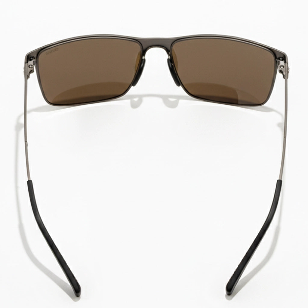 Sunglasses with brown lenses and black frames on a white background
