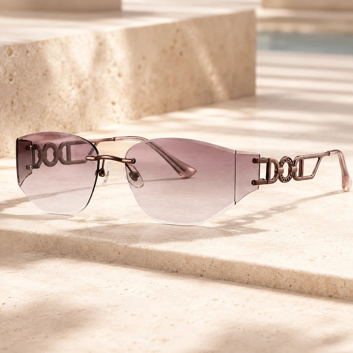 Elegant outdoor portrait of a woman at a luxury resort balcony, wearing Baporssa Muse rimless violet sunglasses with chic rhinestone temple detailing.