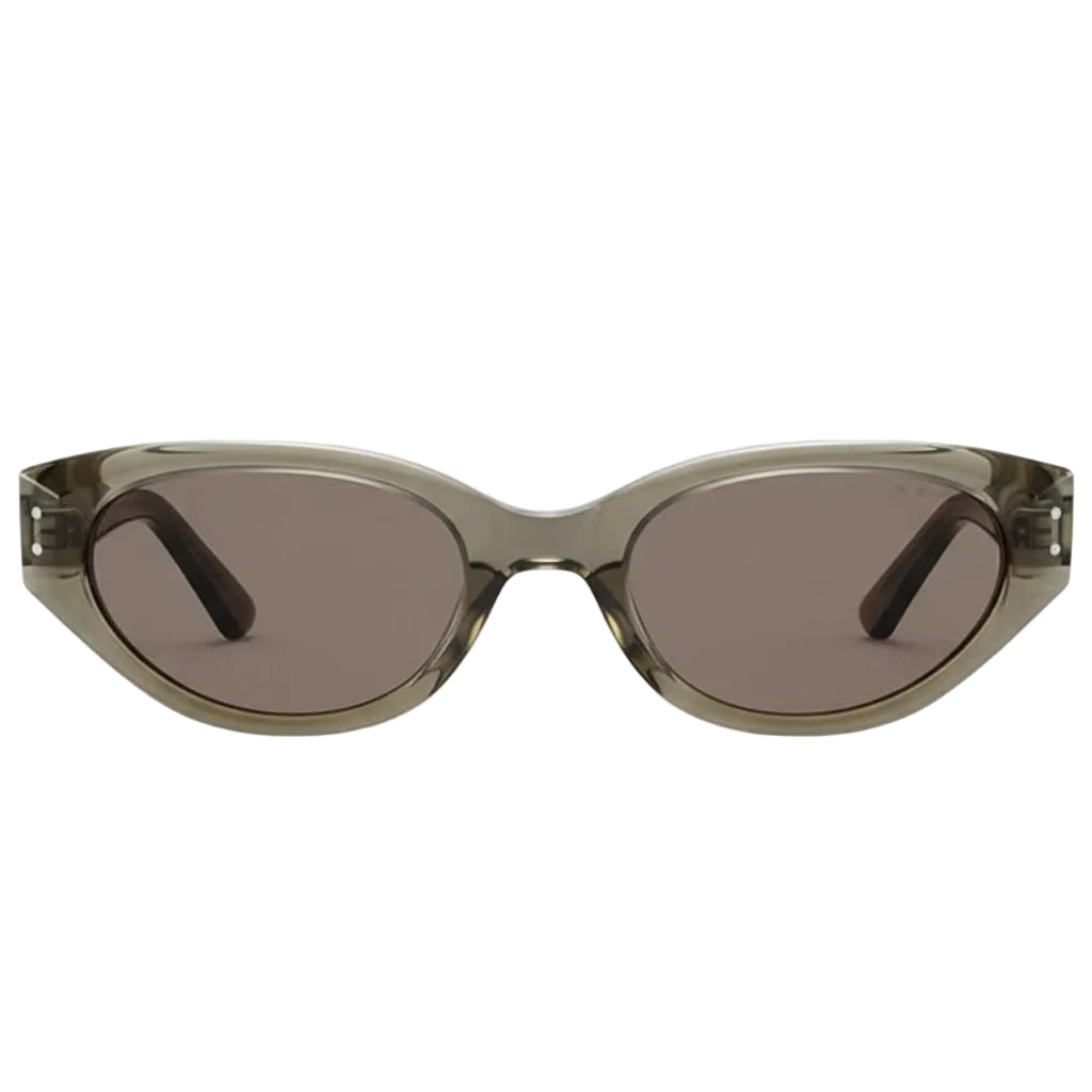Sunglasses with a transparent frame and dark lenses on a white background