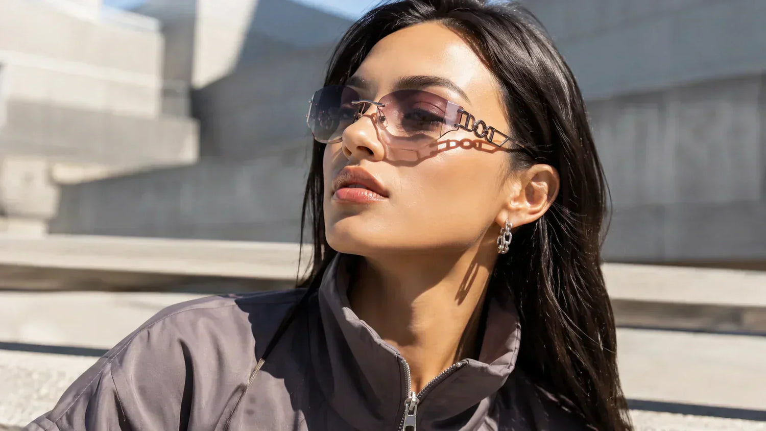 Y2K styled sunglasses with angular frame and rimless design