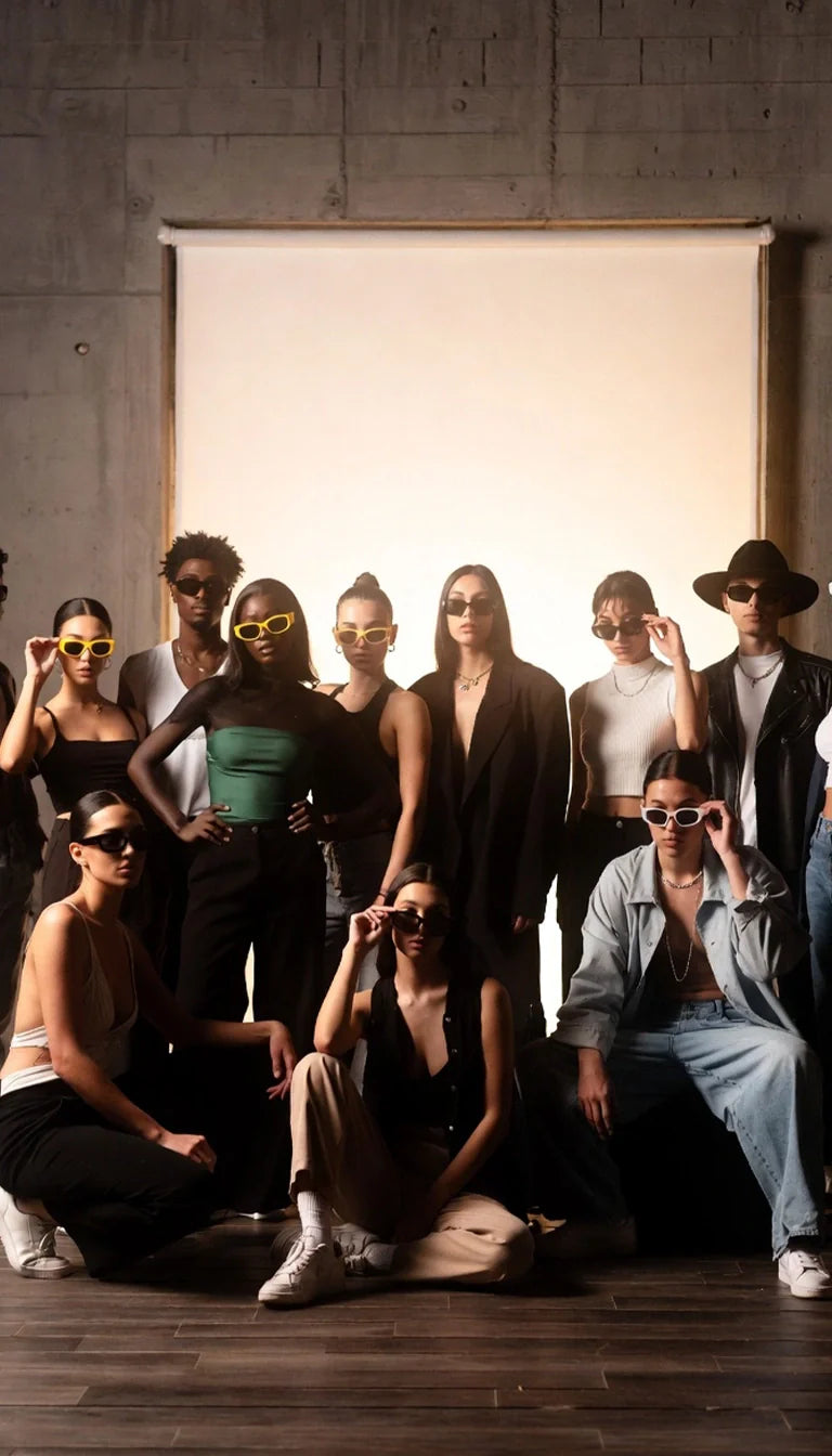 A group of people showcasing a variety of stylish sunglasses, representing diverse fashion expressions and the brand's commitment to inclusive, on-trend eyewear