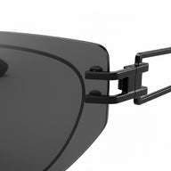 Close-up of a black sunglasses with a white background