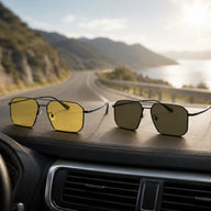 BAPORSSA Shift sunglasses shown on a car dashboard with yellow and dark lenses for changing driving light conditions