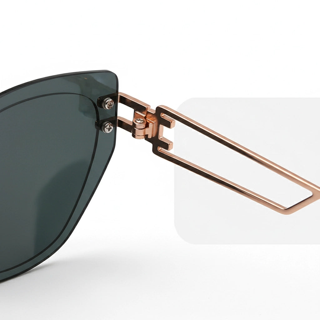 Sunglasses with a rose gold frame and dark lenses on a light gray background