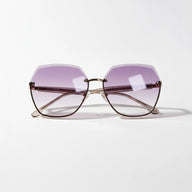 Sunglasses with purple lenses on a white background