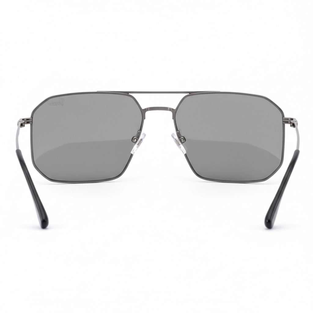 Sunglasses with metallic frame and dark lenses on a white background