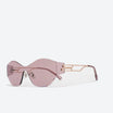 Pink shield sunglasses with geometric rose gold side accents, showcasing a bold, sculptural design that merges luxury and modern eyewear trends.