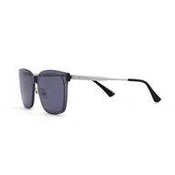 Sunglasses with dark lenses and black and silver frame on a white background