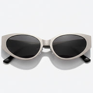 Sunglasses with a metallic frame and black lenses on a white background