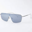 Minimalist oversized flat-top sunglasses with thin silver metal frames and light gray tinted lenses, displayed against a clean white background, showcasing modern, sleek design.