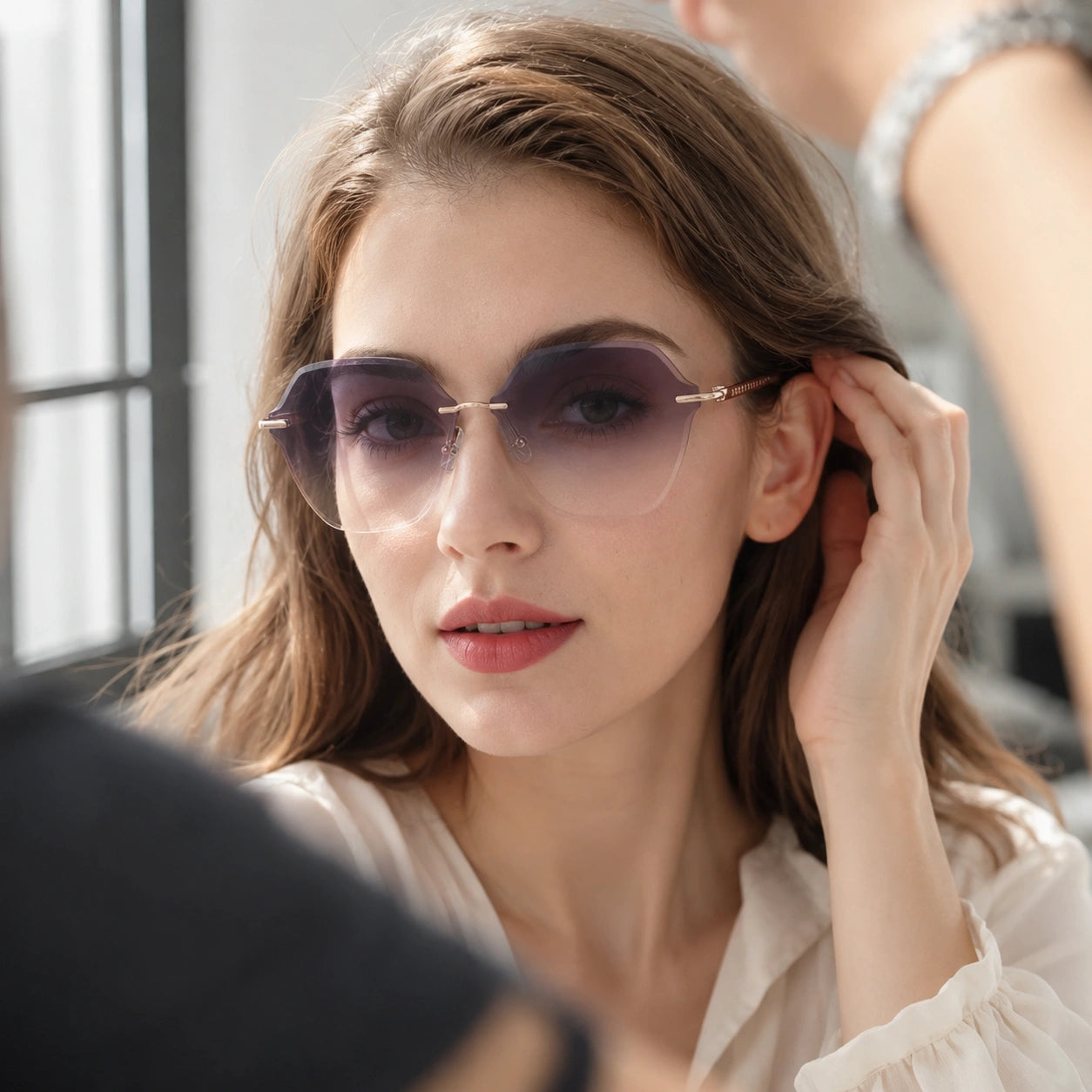 Stylish woman wearing gradient hexagonal rimless sunglasses