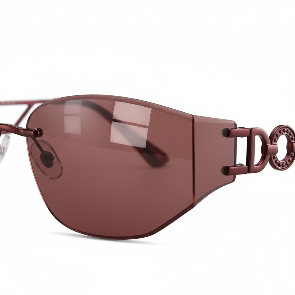 Side view of DO crystal rimless sunglasses showing futuristic wine red temple design