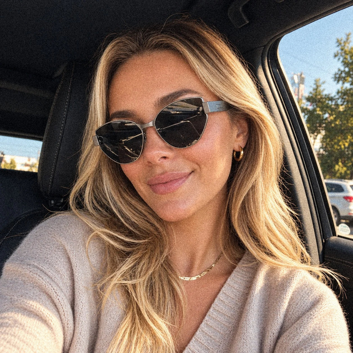 BAPORSSA Onyx sunglasses in Grey, worn on a drive