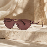 BAPORSSA edge burgundy lens rimless sunglasses still life