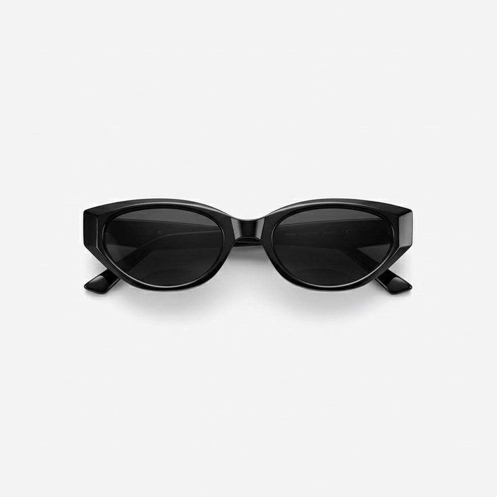 Front view of classic black cat-eye sunglasses on white background, glossy acetate frame