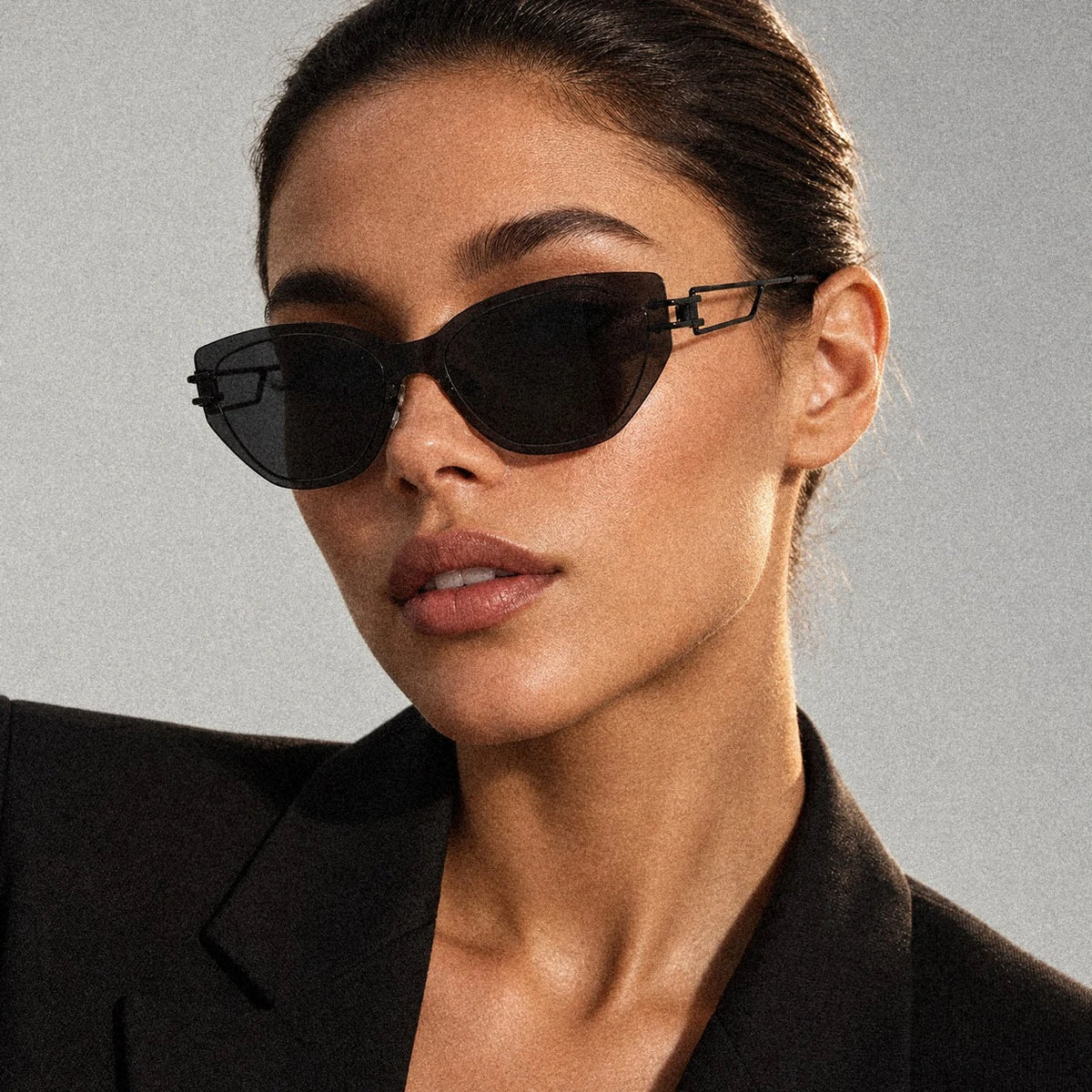 BAPORSSA Edge sunglasses in Black, worn by a model, front close up