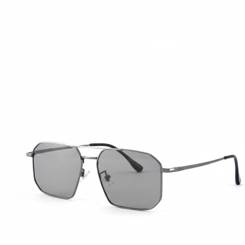 Sunglasses with a silver frame and dark lenses on a white background