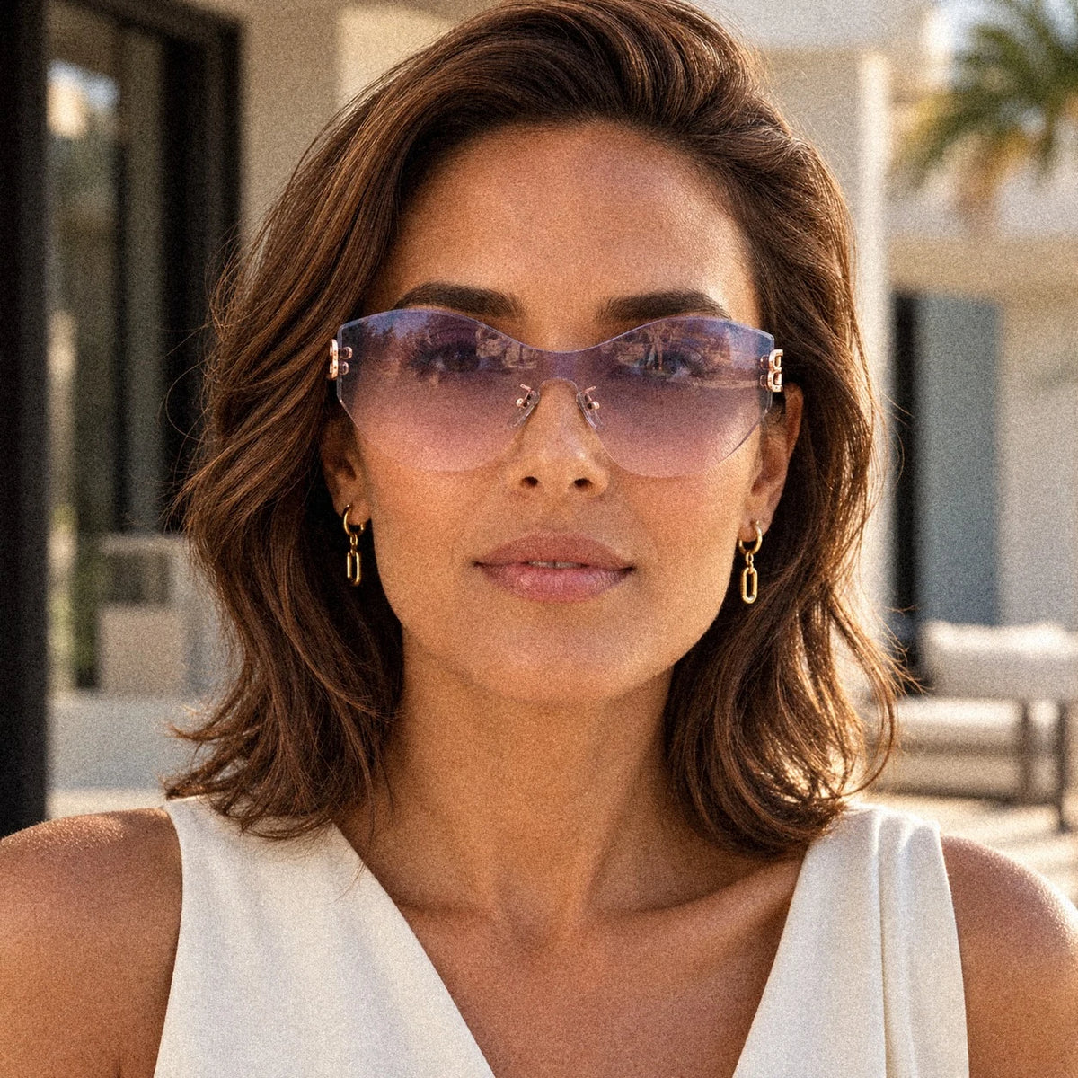 BAPORSSA Vanguard sunglasses in Blue-Pink Gradient, worn by a model outdoors