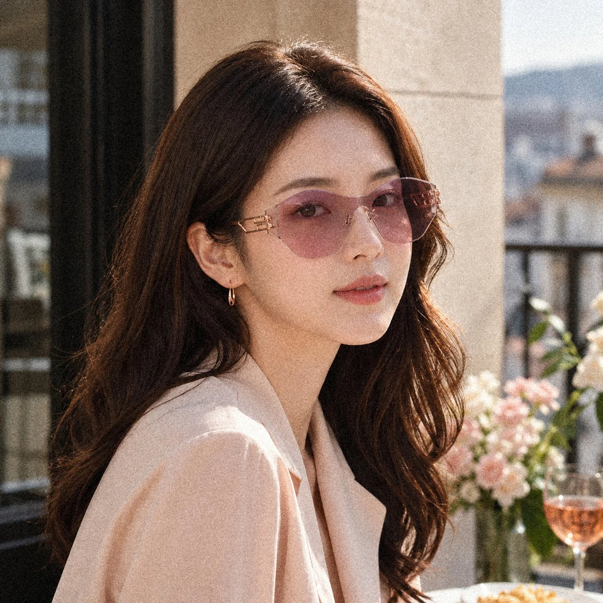 BAPORSSA Vanguard sunglasses in Pink, worn by a model on a terrace