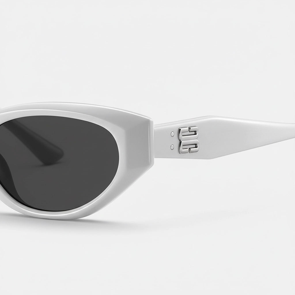 Close-up temple detail of white cat-eye sunglasses, silver BB metal logo craftsmanship