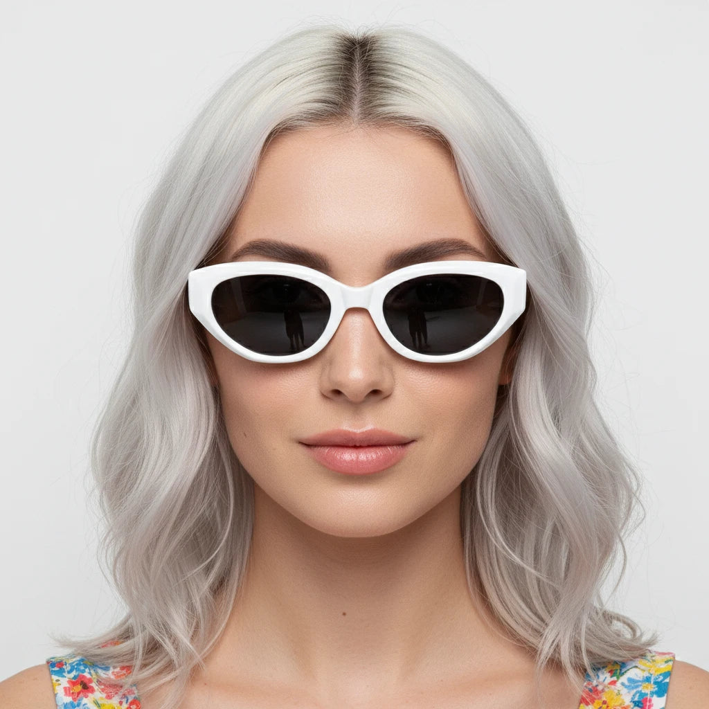 Platinum blonde model front view wearing white cat-eye sunglasses, cool luxury vibe